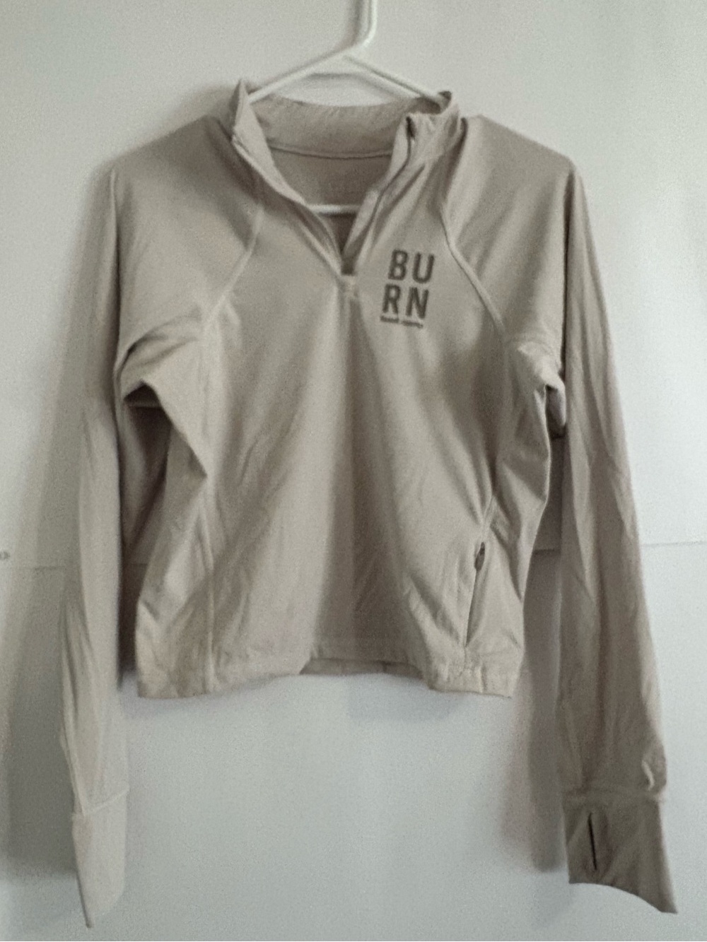 BURN Boot Camp Pullover CropJacket - Light Beige Quarter-Zip 

Size Medium